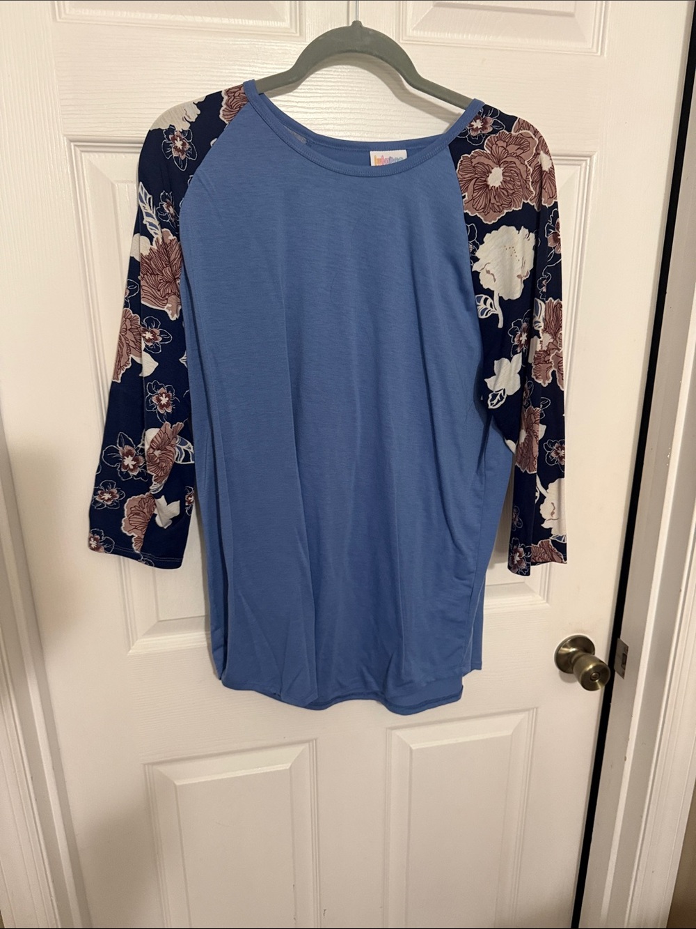 LuLaRoe Blue Top with Navy Floral Raglan Sleeves